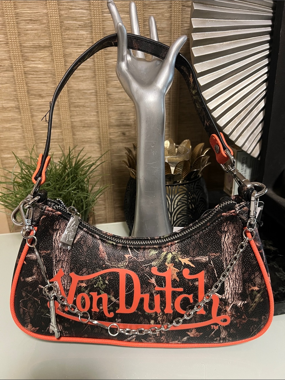 NWT. Viral Von Dutch TREE CAMO SHOULDER BAG with orange trim